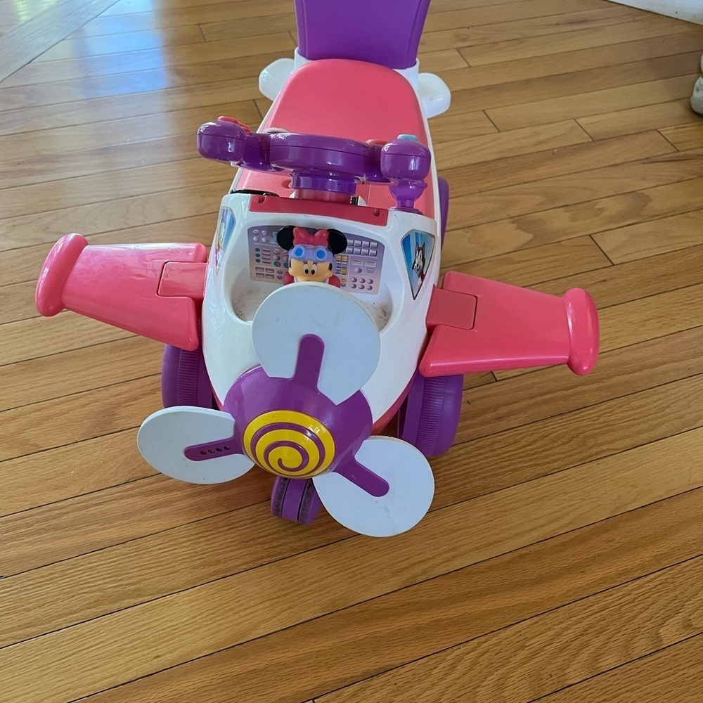 Disney’s Minnie airplane Pink + Purple Ride-On Airplane Toy